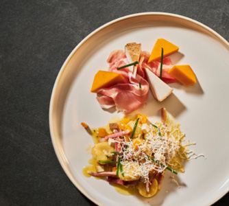 /ricette/gnocchi-di-zucca-al-cucchiaio-speck-di-sauris-e-ricotta-affumicata